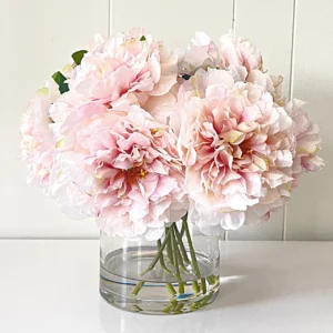 A picture of a faux pink huge peony stem.